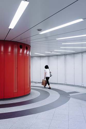 tochomae station woman walking in hallway shinjuku